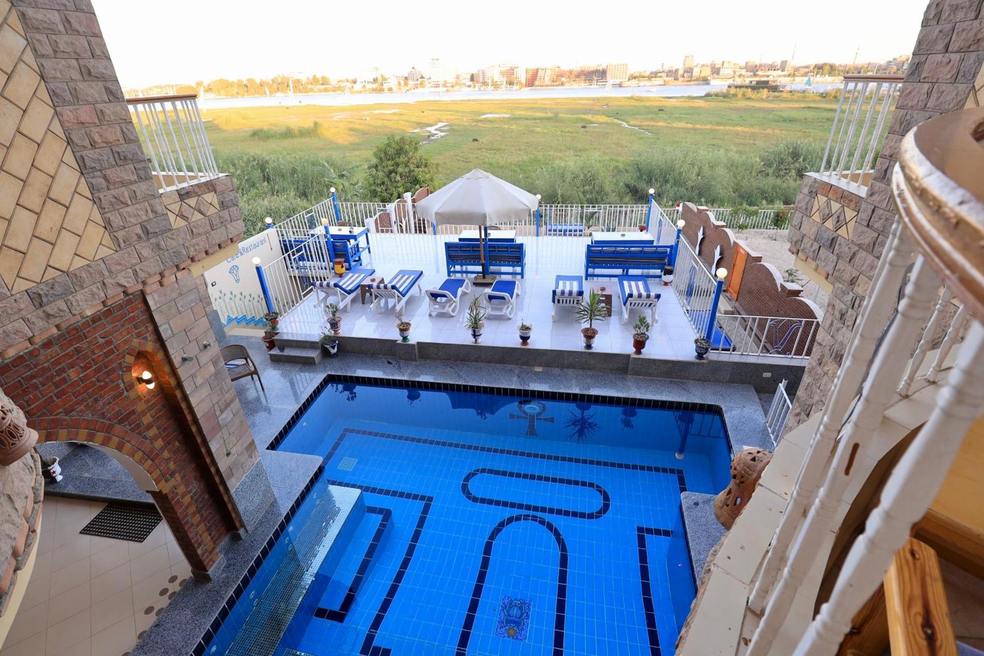 Blue Nile House Apartment Луксор Стая снимка