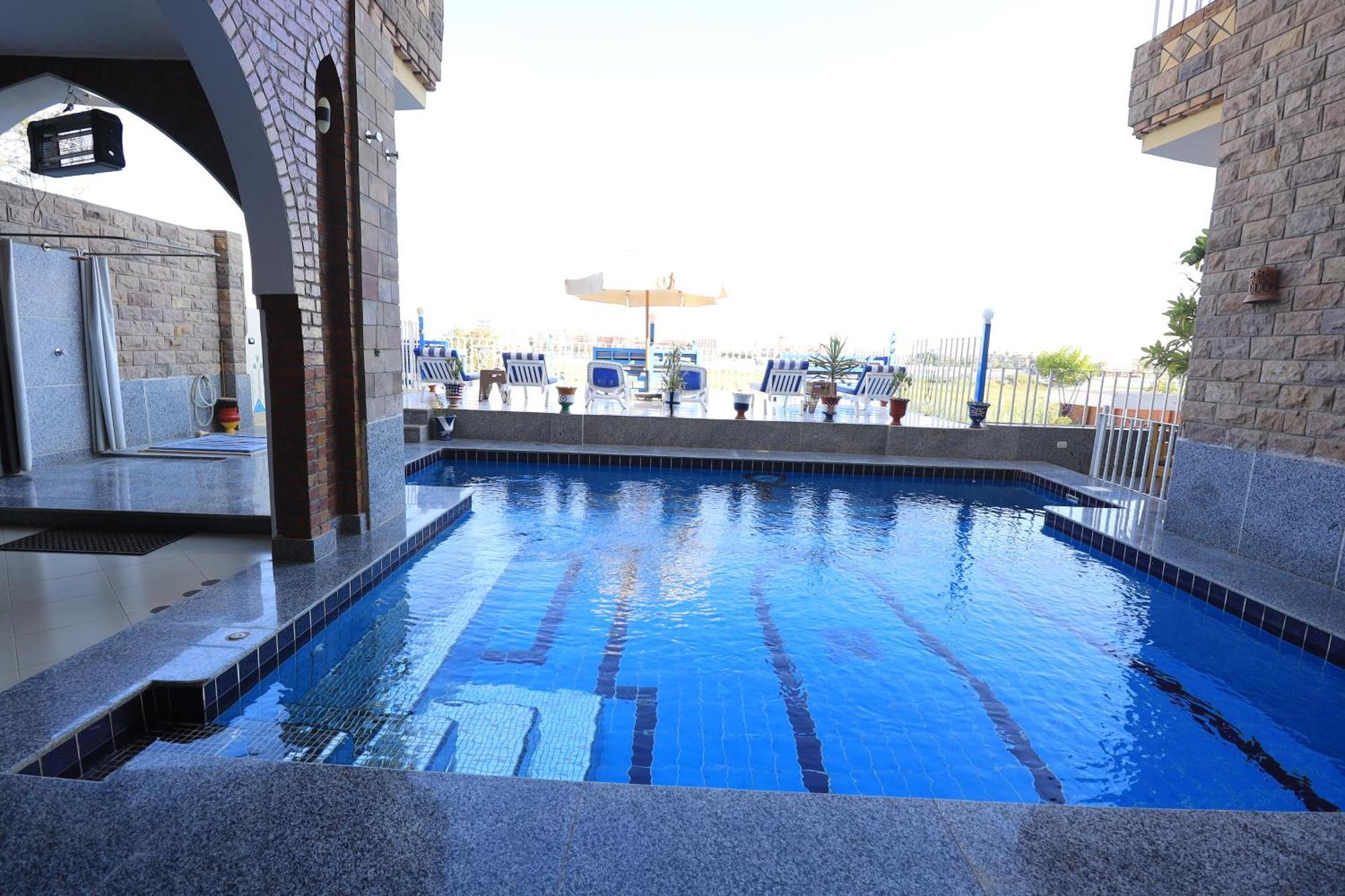 Blue Nile House Apartment Луксор Стая снимка